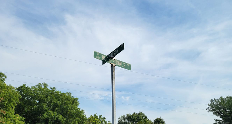 street sign sunny day